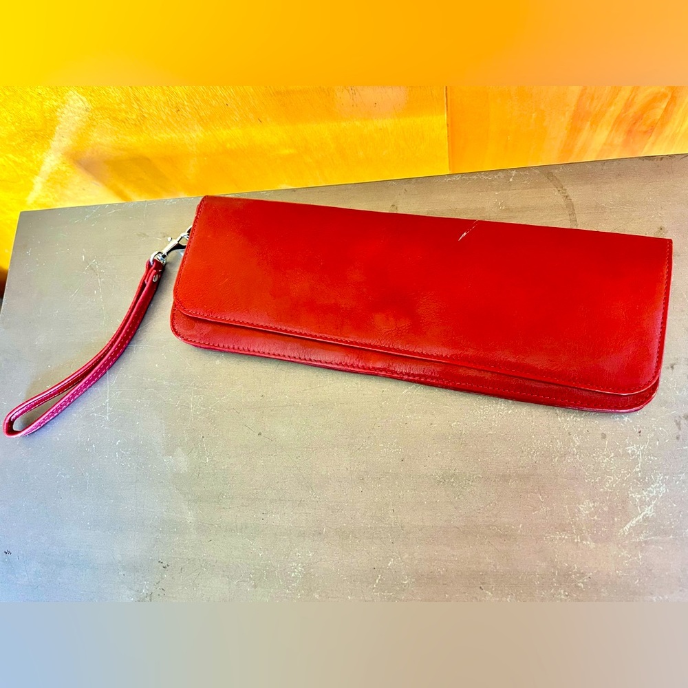 Wilson’s Leather Rectangular Clutch in Red.